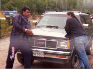 Russell Diabo (ABL Advisor) and Algonquins of Barriere Lake Chief Jean Maurice Matchewan talking during logging blockade, circa 1989.